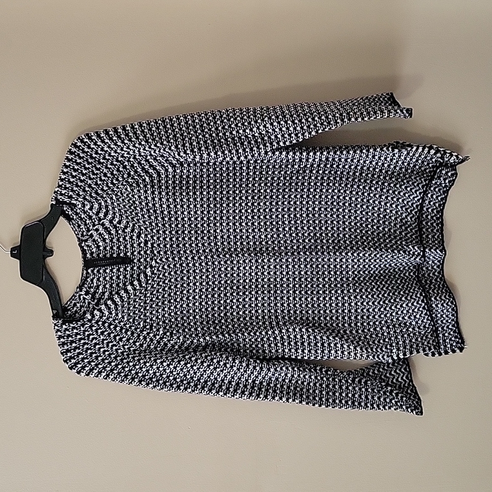 A medium black and white popover sweater from Aeropostale